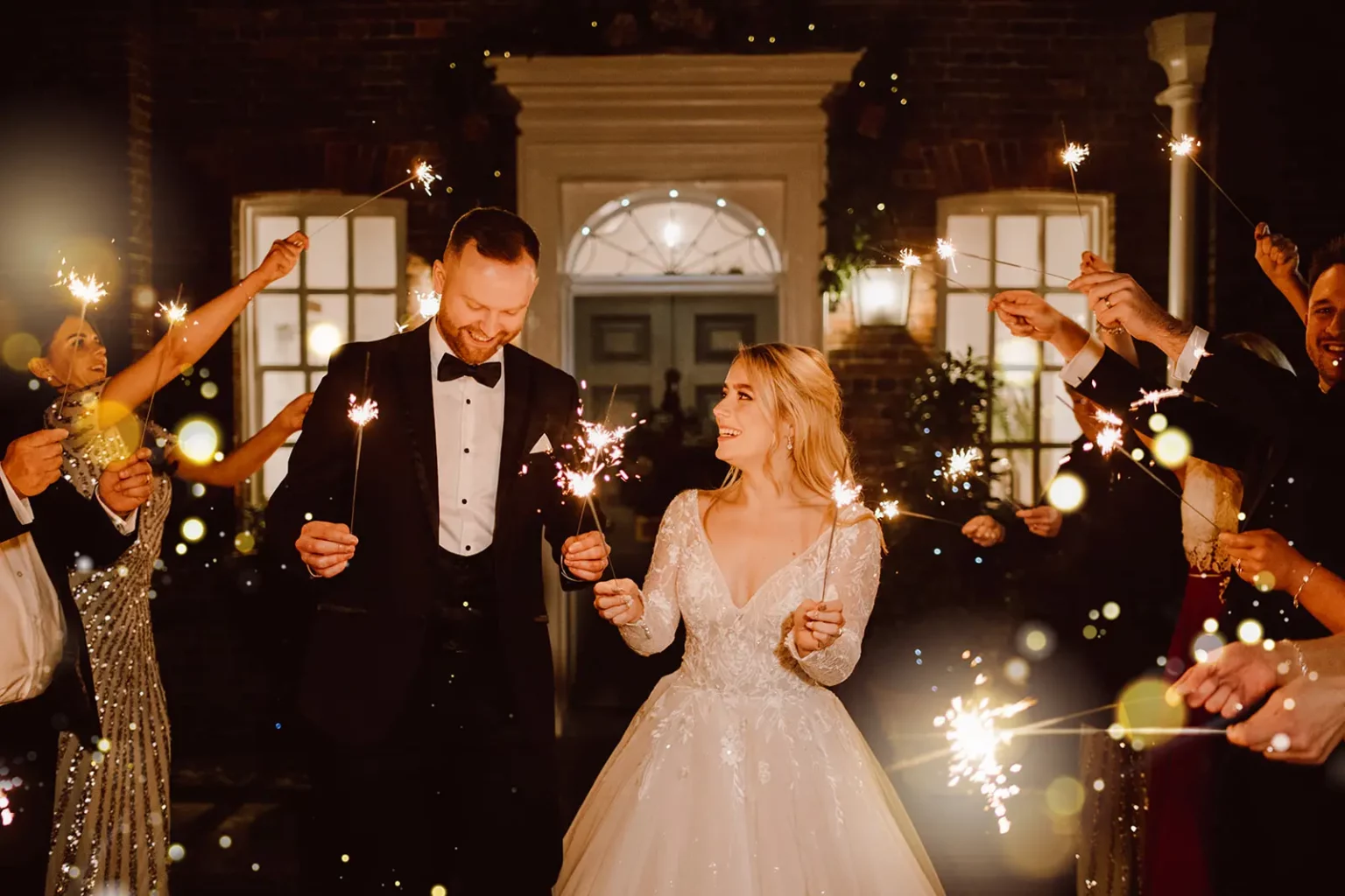 pelam house bride and groom sparklers