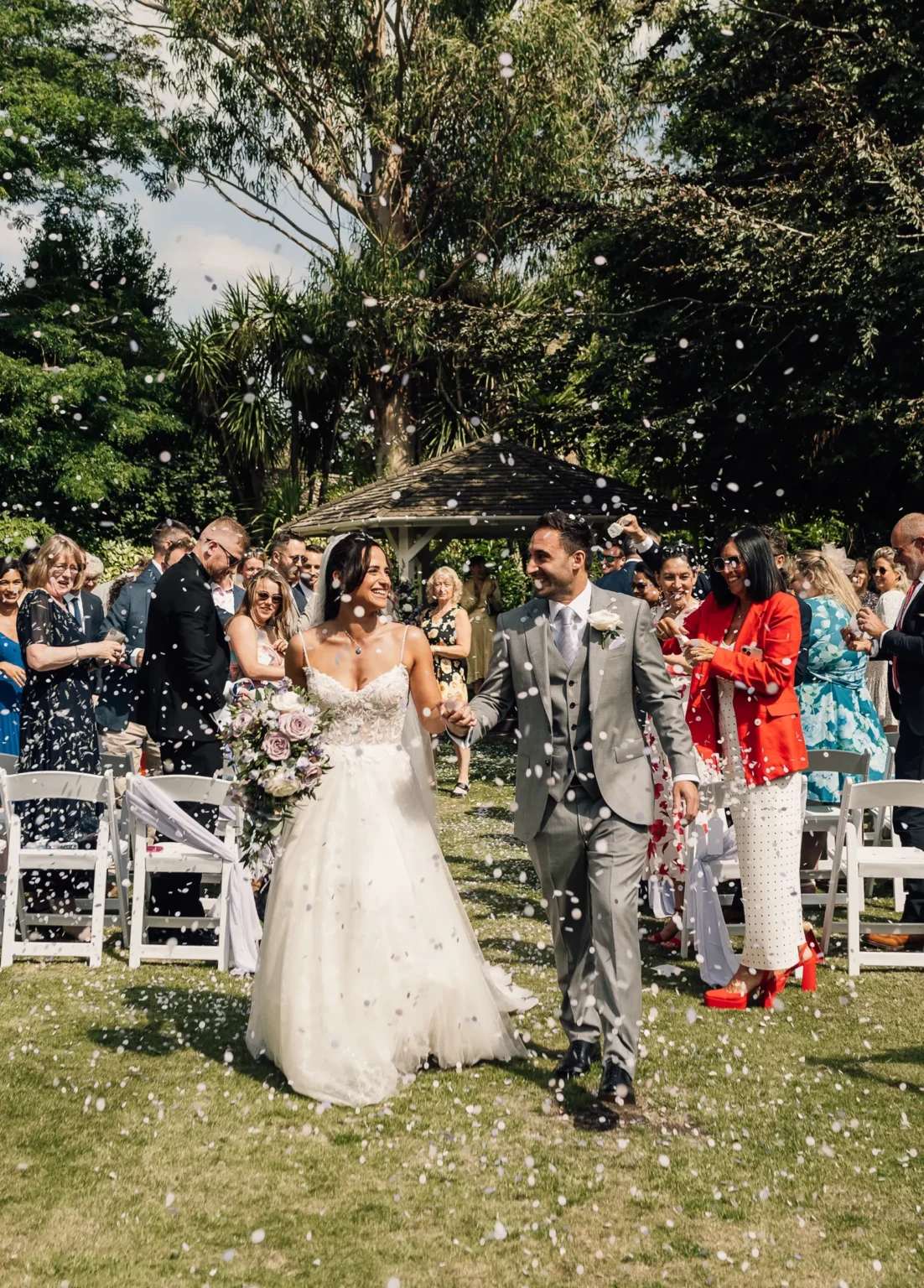 Bride and groom just married in the Gazebo at Pelham House